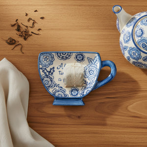 Blue willow teabag dish showing classic blue and white pattern design