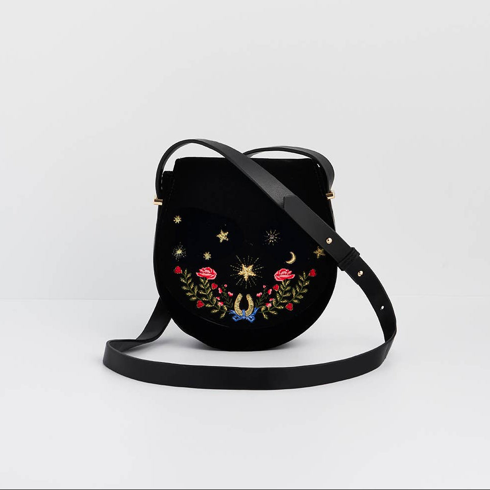 Black Dove and Floral Star Velvet Embroidered Saddle Bag embroidery close-up showing dove and floral star details