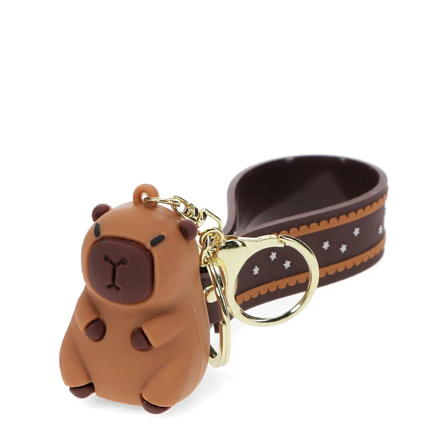 Brown capybara keyring charm with wristlet strap and gold hardware.