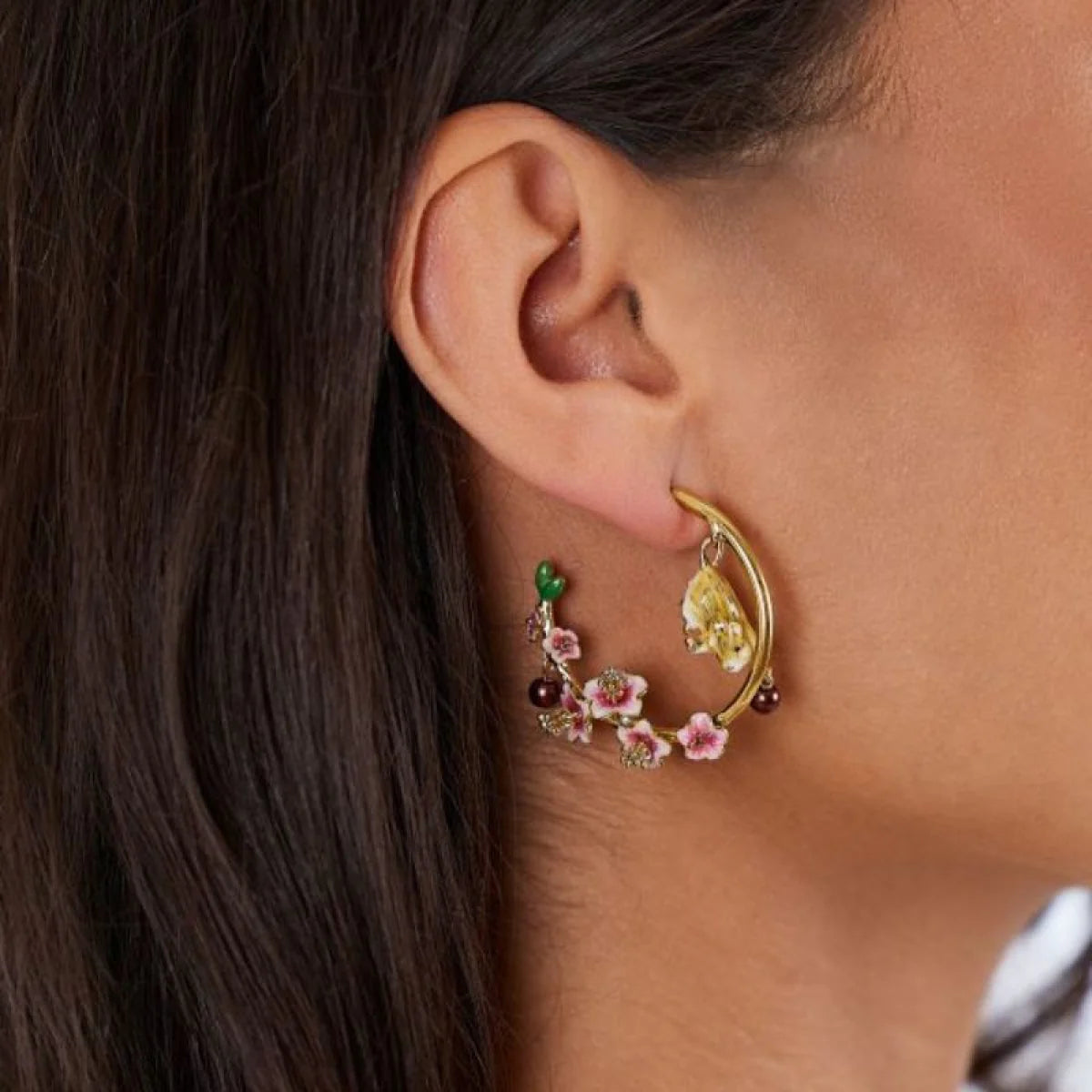 Model wearing Conker Mouse Hoop Earrings showcasing detailed woodland design.