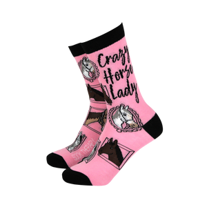 Pink women’s bamboo socks with horse illustrations and “Crazy Horse Lady” text, black heel and toe accents.