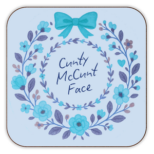 Blue floral wreath coaster with rude text.