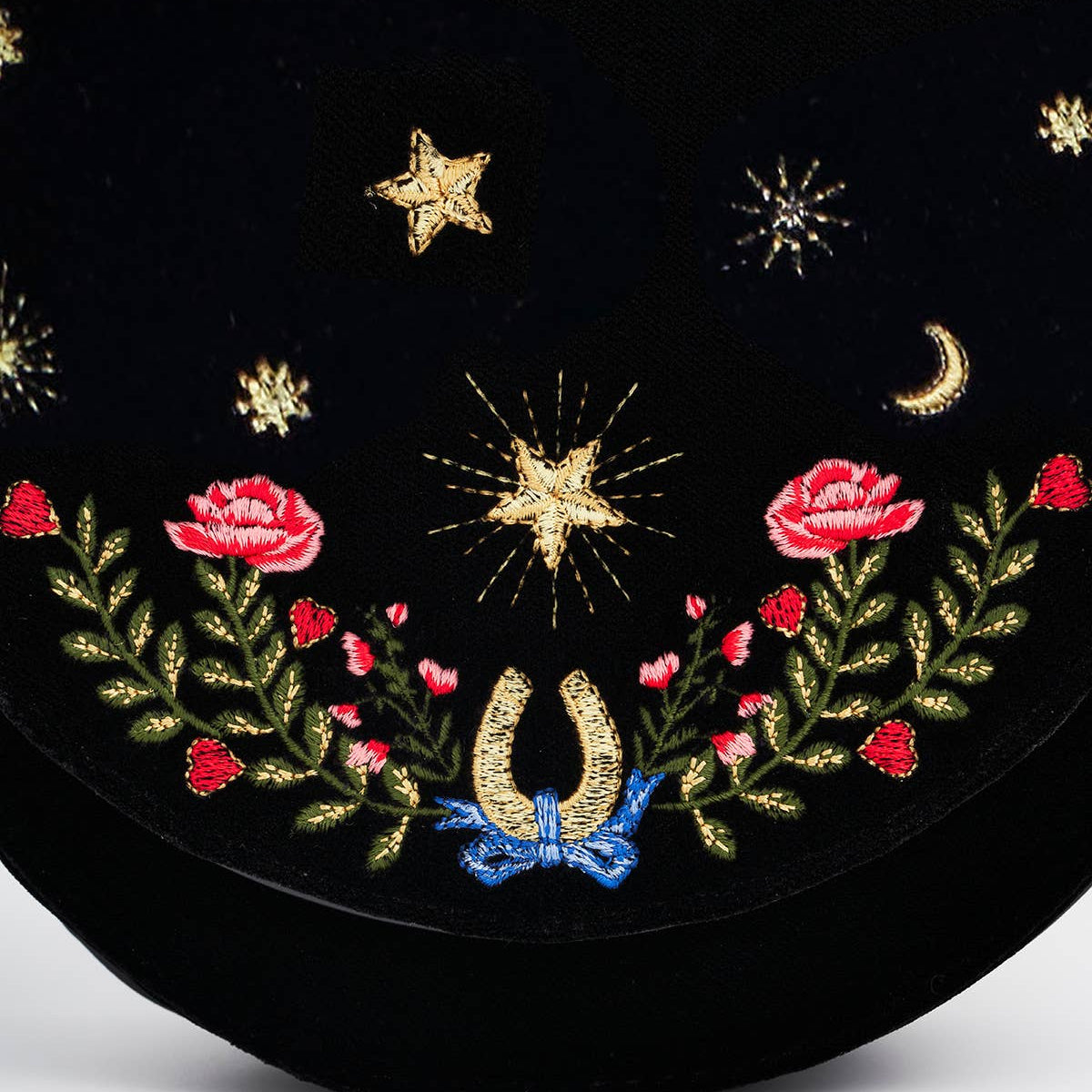 Black Dove and Floral Star Velvet Embroidered Saddle Bag magnetic closure detail