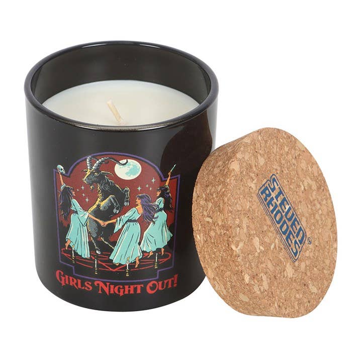 Dark opium candle with wooden wicks burning and cork coaster