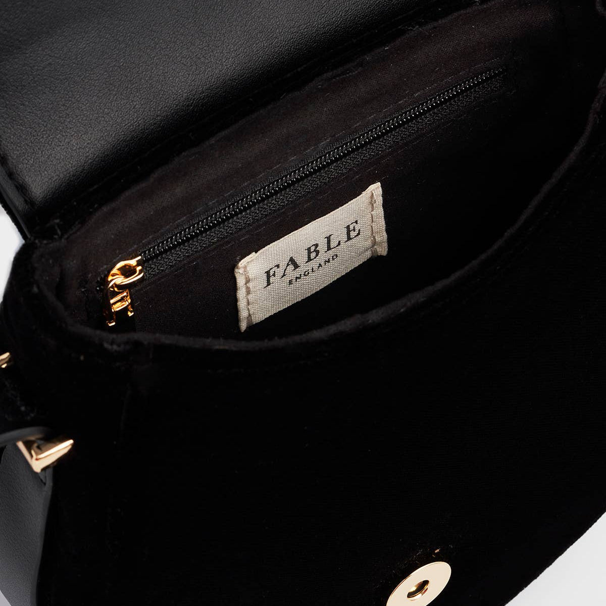 Black Dove and Floral Star Velvet Embroidered Saddle Bag styling shot worn on shoulder