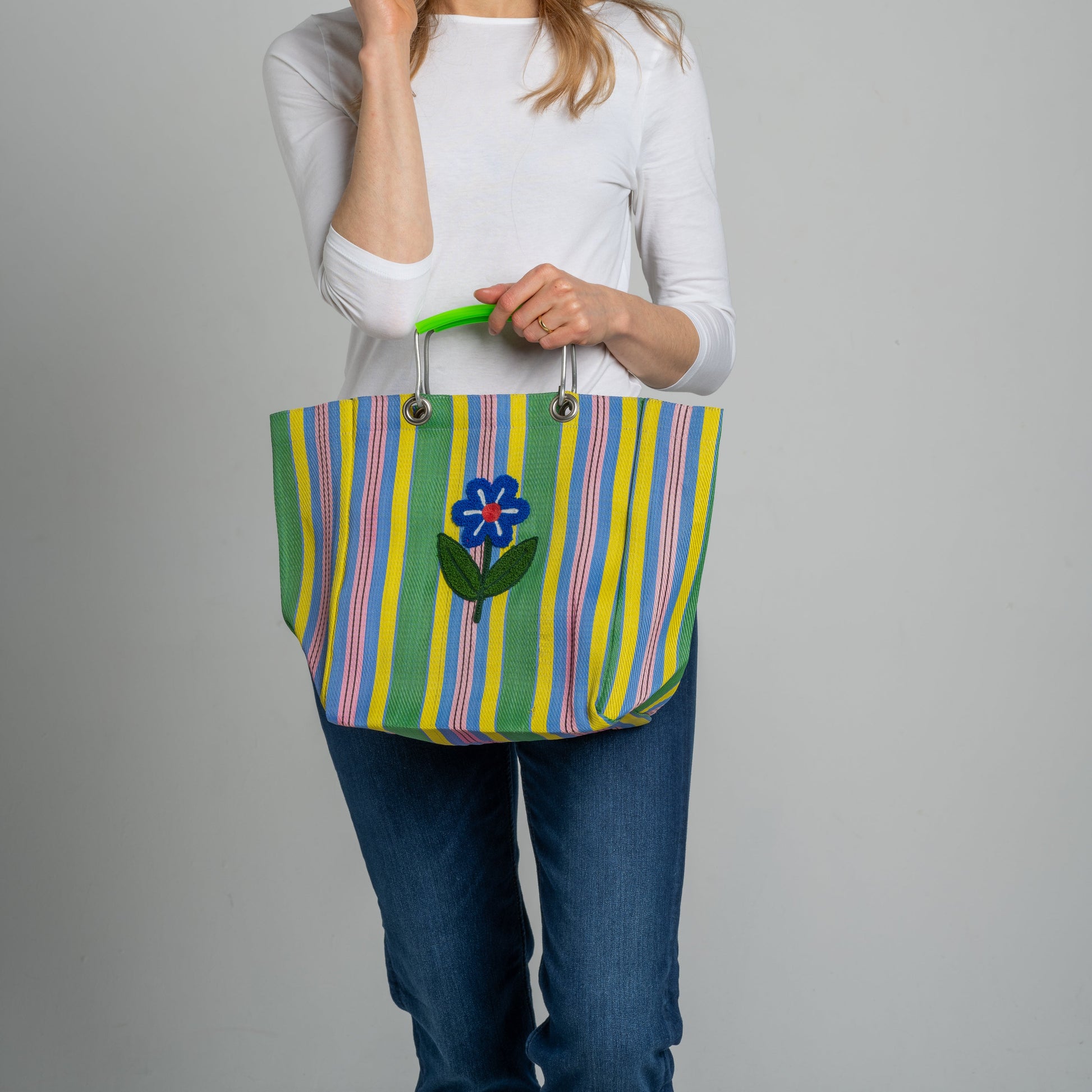 Flower Stripe Market Tote Bag with hand-embroidered flower and bright striped fabric