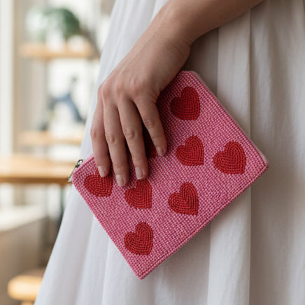 Hearts beaded purse with pink and red hearts on cream background