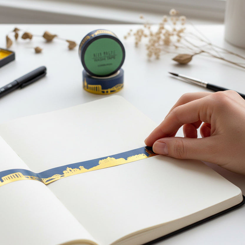 Edinburgh washi tape roll with gold foil landmark design unrolled.