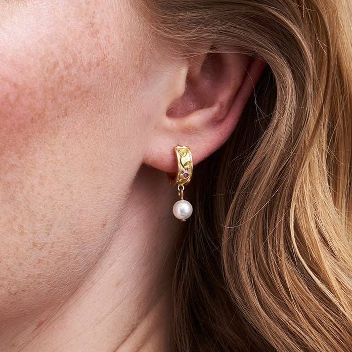 Blackberry Bramble pearl drop earring worn on model showing scale and styling