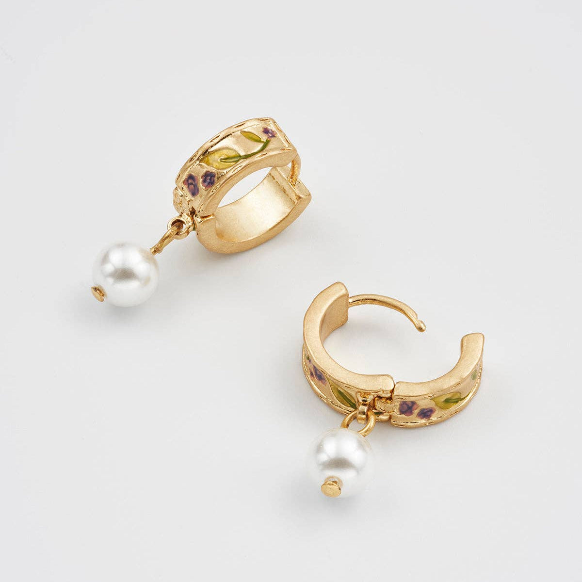 Blackberry Bramble earrings showing huggie clasp mechanism on white background