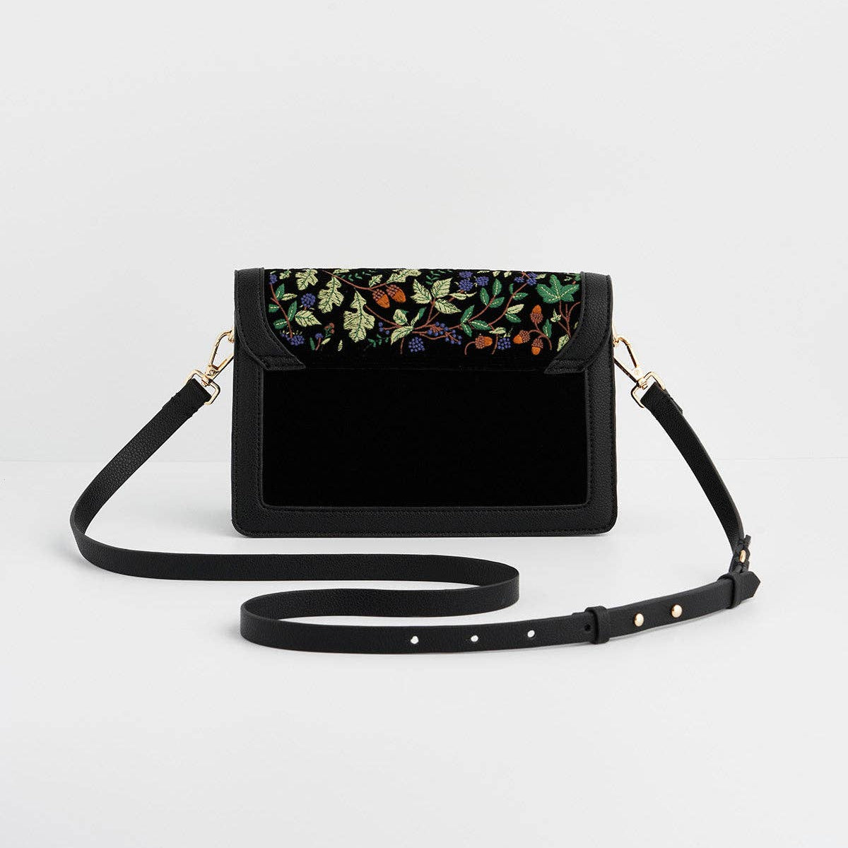 Cathy bag back view with flap open showing front pocket