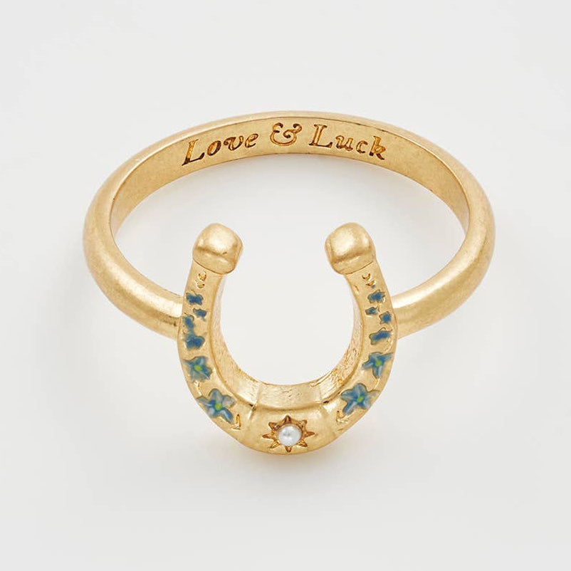 Horseshoe ring showing Love and Luck engraving inside band