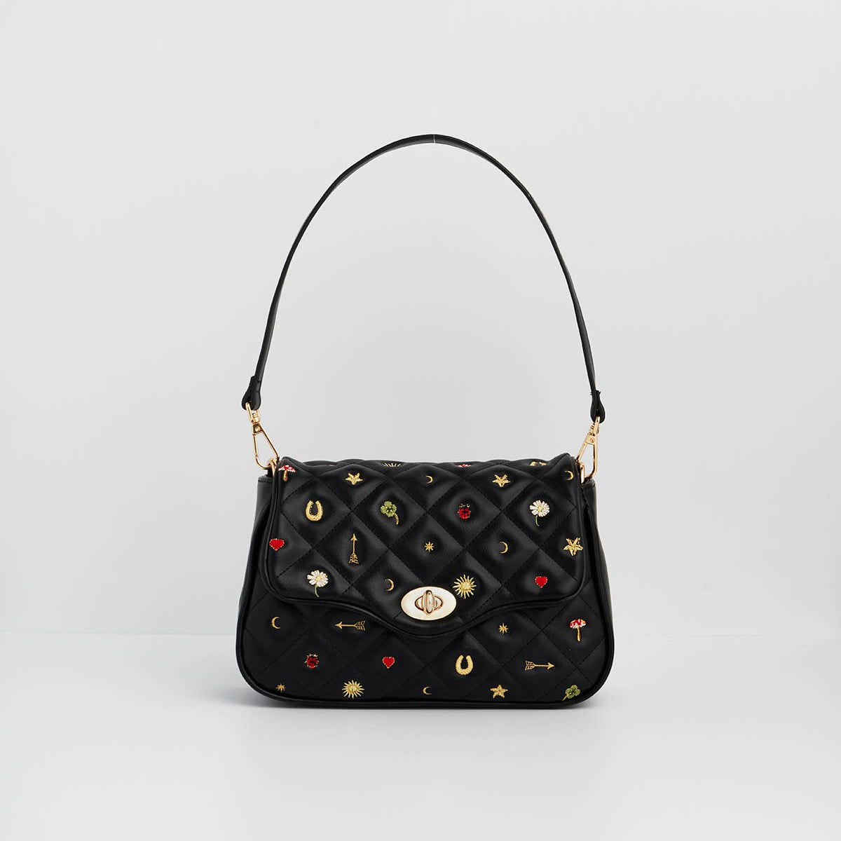 Black Quilted Motif Embroidered Crossbody front view showing colourful floral embroidery on quilted faux leather