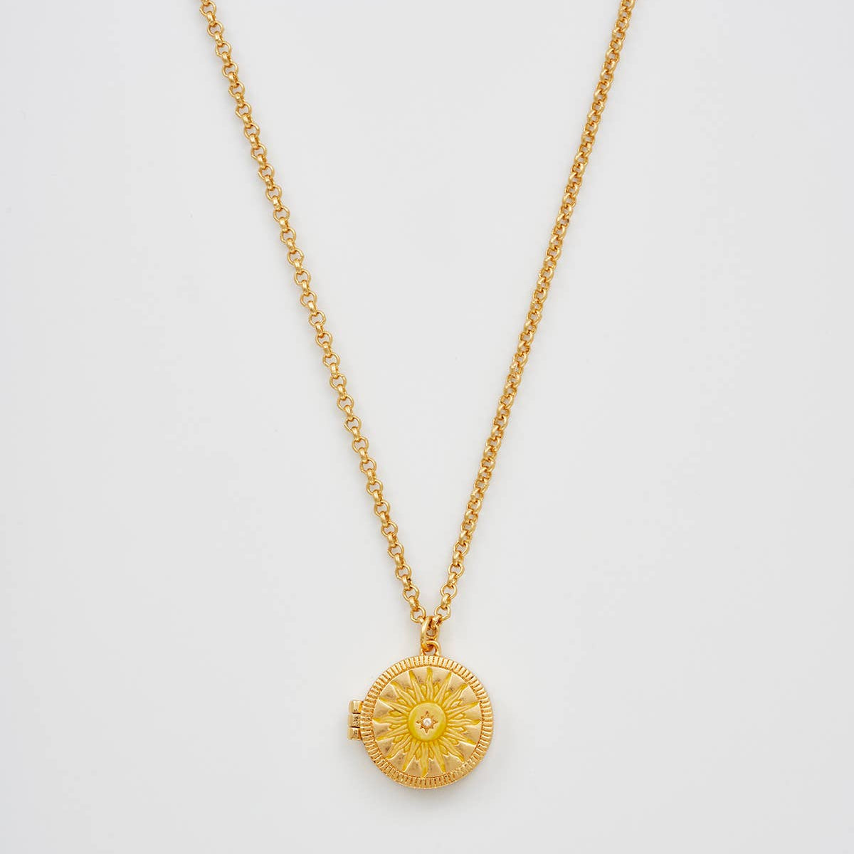 Sun locket necklace full length on white background showing chain