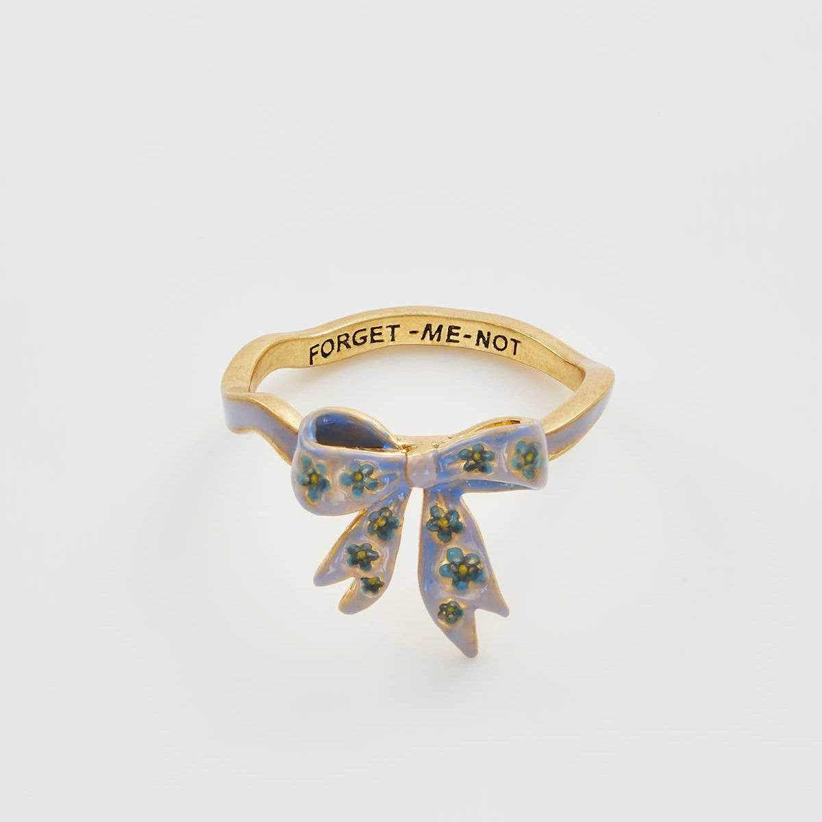 Front view of gold Forget-Me-Not bow ring with blue enamel flowers.