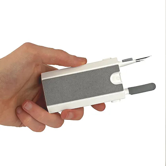 Close-up of gadget cleaner with keycap puller extended.