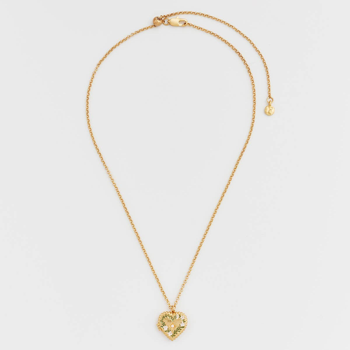 Gaia Lily Heart Locket Necklace laid flat showing adjustable chain and clasp.