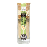 Garden Spritz Cocktail Mix by Quai Sud in tall glass bottle with cork lid and green label, layered with lemon peel, mint, apple pieces and cane sugar.