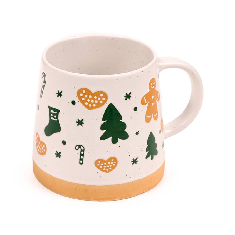 Gingerbread Man Tapered Stoneware Mug with green and gold Christmas pattern including gingerbread men, trees, and hearts on a white ceramic background.