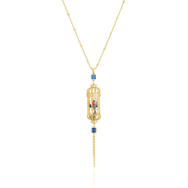 Close-up of Bill Skinner Bird Cage Pendant with blue crystal detailing.