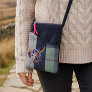 Highland Cow Applique Sling Bag worn crossbody showing tweed design