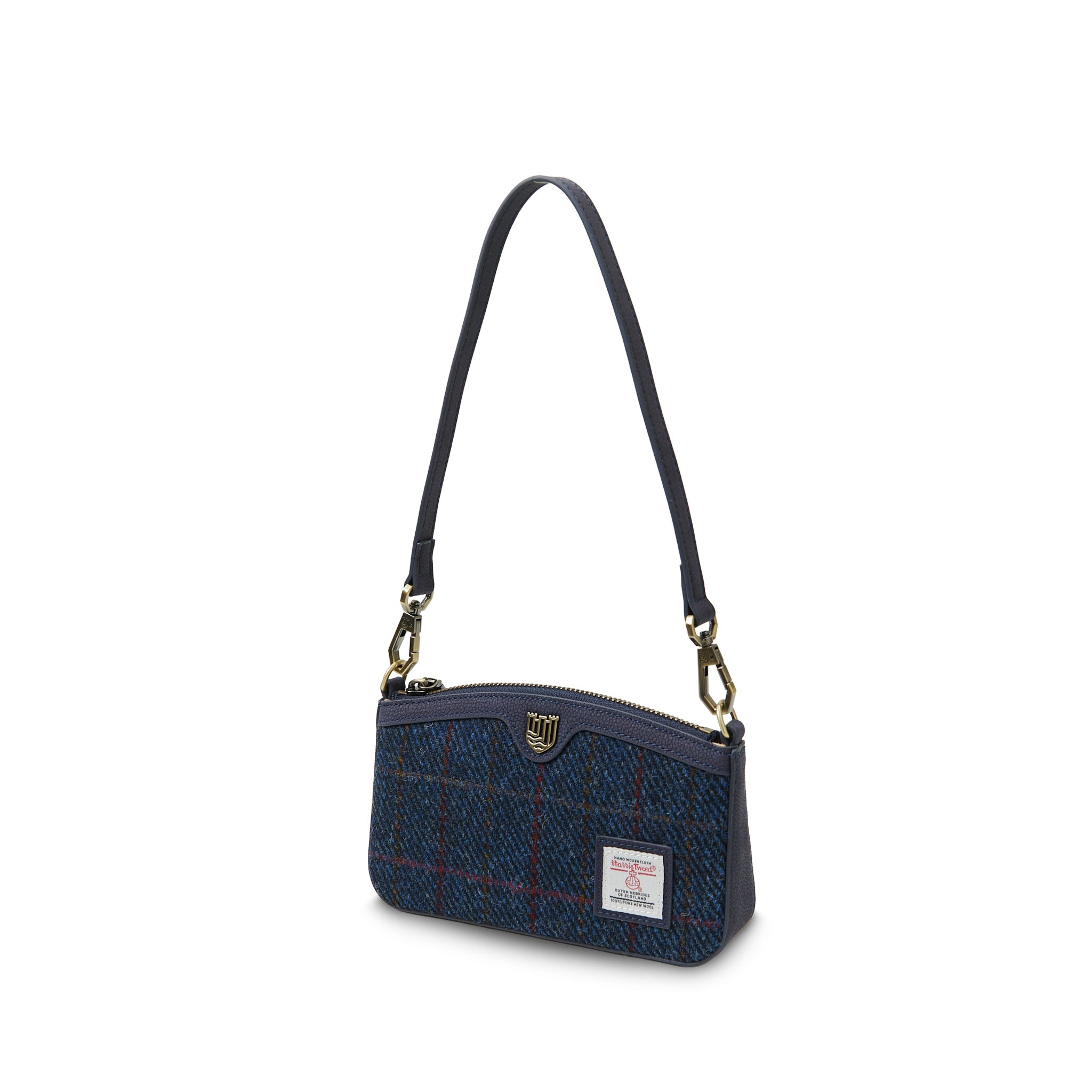 Close-up of navy over-check Harris Tweed texture and Islander clasp detail