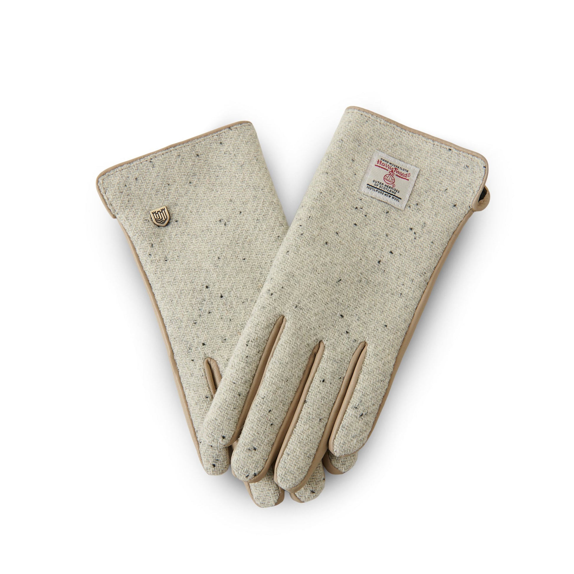 Harris Tweed cream gloves worn holding steaming mug outdoors in Scottish countryside