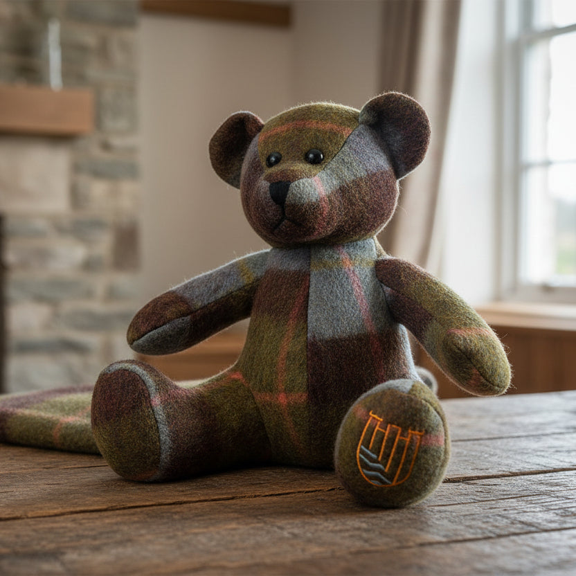 Lambswool teddy chestnut and blue tartan on rustic table by window.