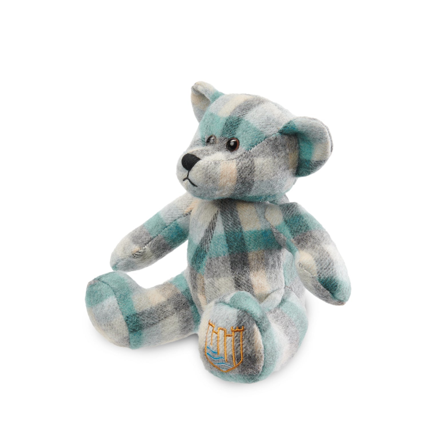 Lambswool teddy teal Islander tartan angled view on white background.