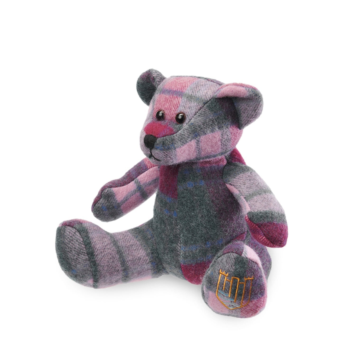 Lambswool teddy pink and blue tartan angled view on white background.
