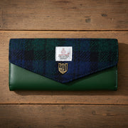 Black Watch tartan Harris Tweed clasp purse on wooden surface