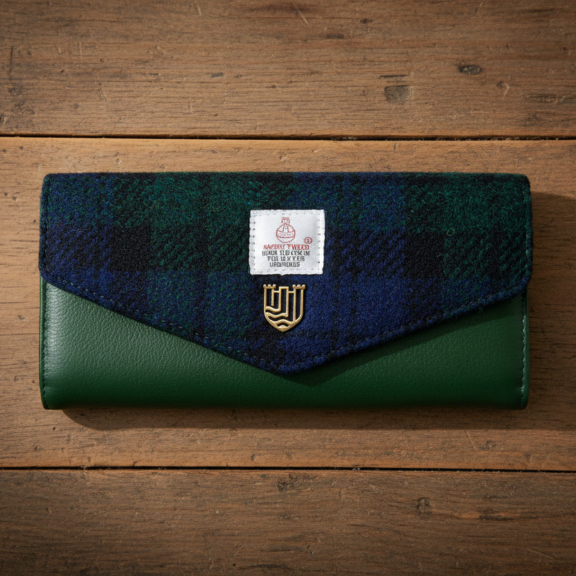 Black Watch tartan Harris Tweed clasp purse on wooden surface