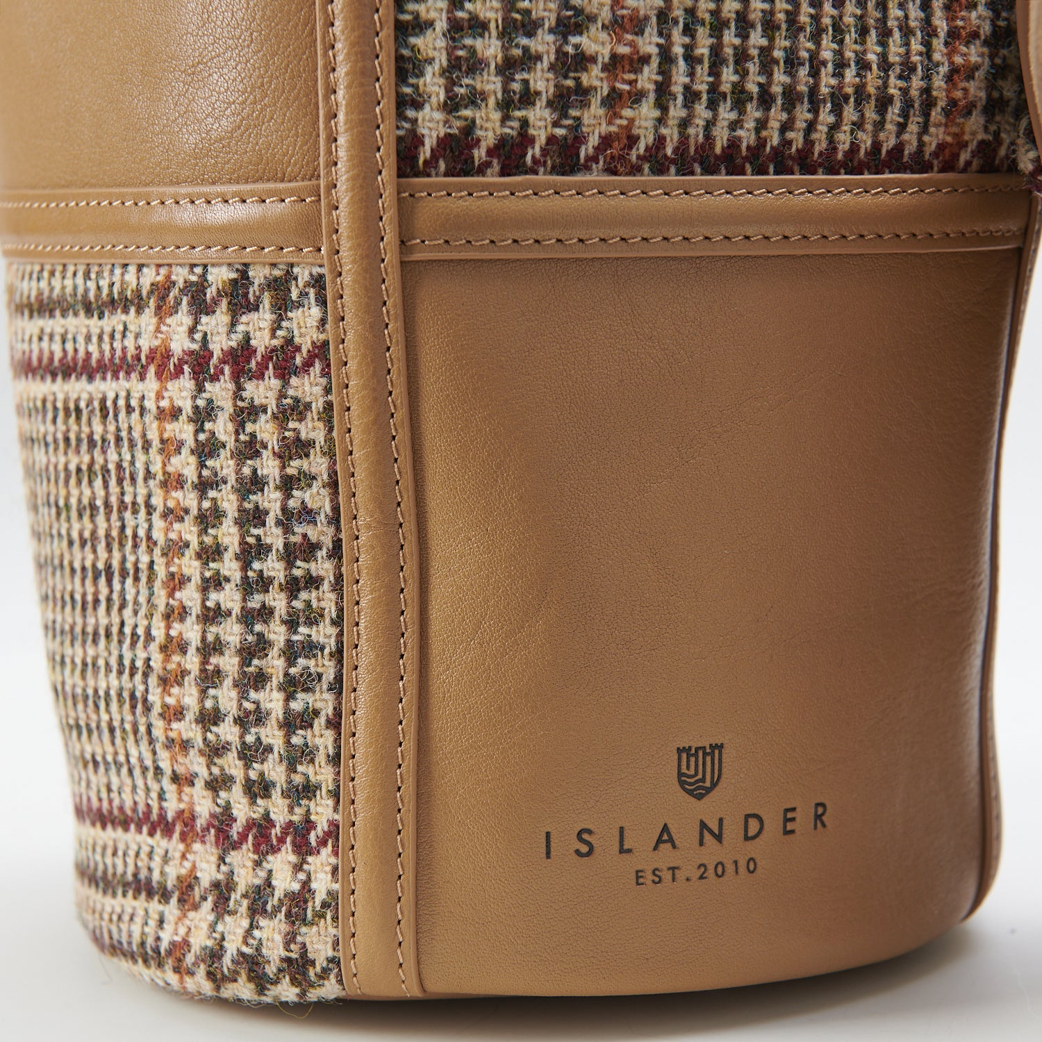 Orlagh beige dogtooth bucket bag back view showing Islander branding