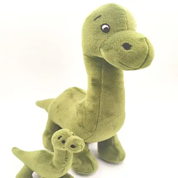 Nessie stuffed plush toy showing embroidered eyes and soft green fabric, white background