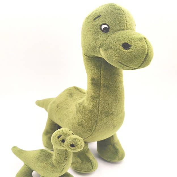 Loch Ness Nessie plush toy in green with a tiny baby Nessie on white background