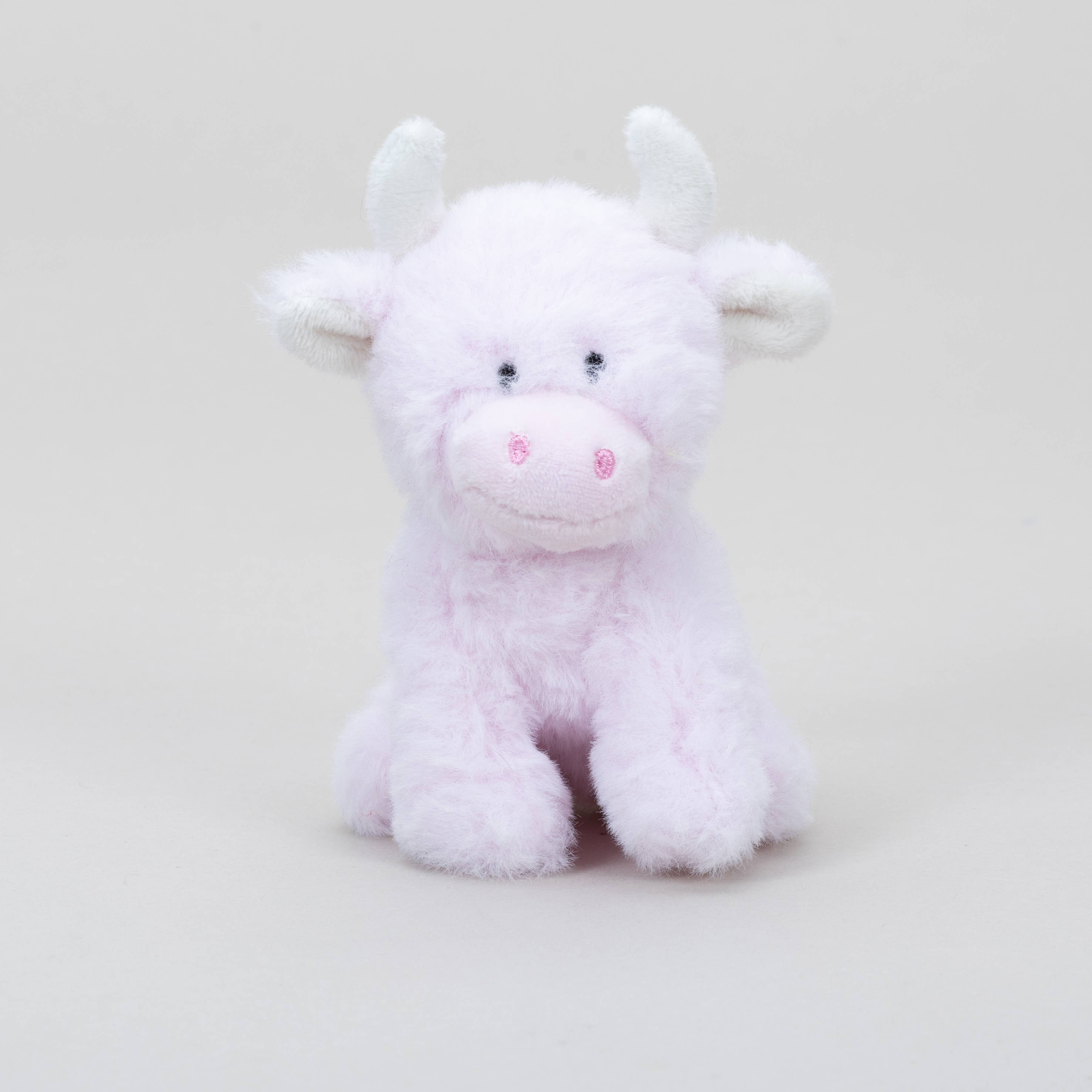 Pink highland cow COOllectible plush front view on grey background