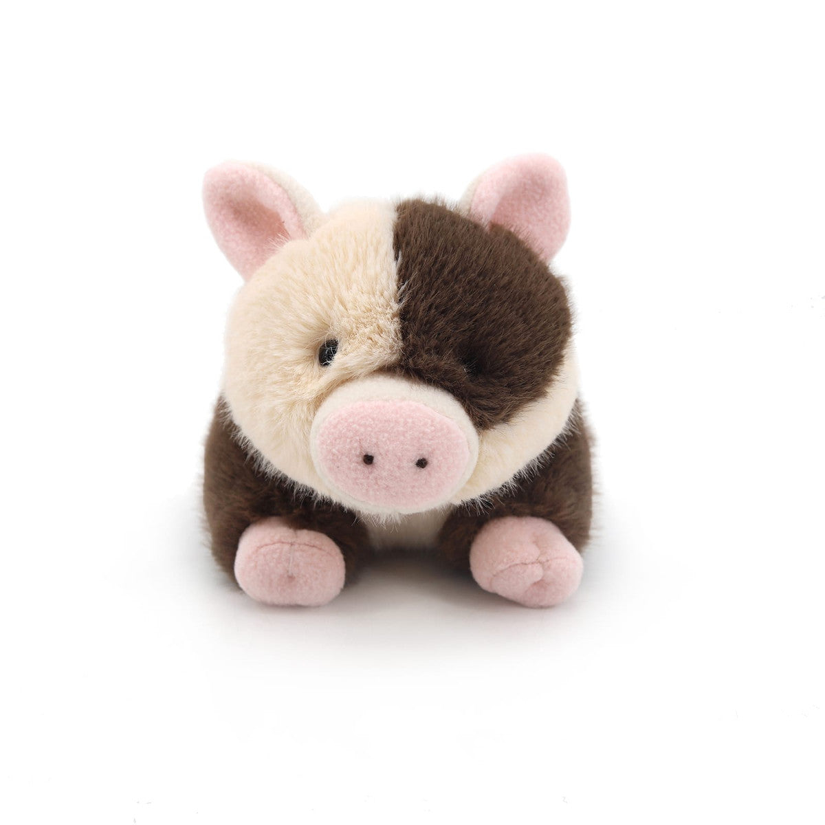 Spotty pig plush toy with pink snout front view on white background