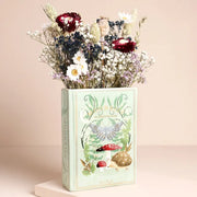 Moonrise woodland book vase with dried flowers on beige background - front view