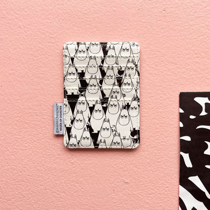 Back view of Moomin Angry Moomin Cardholder featuring repeat black-and-white Moomin print on PVC.
