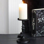 Mystic raven pillar candle holder with The Raven book in gothic setting