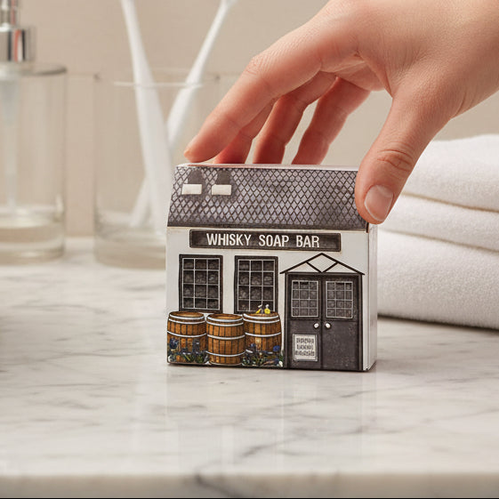 Distillery illustrated bar soap with charming distillery scene - front packaging view.