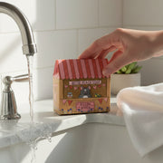 Kissing Booth bitter peach bar soap with French Bulldog illustration - lifestyle bathroom shot.