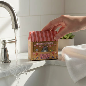 Kissing Booth bitter peach bar soap with French Bulldog illustration - lifestyle bathroom shot.