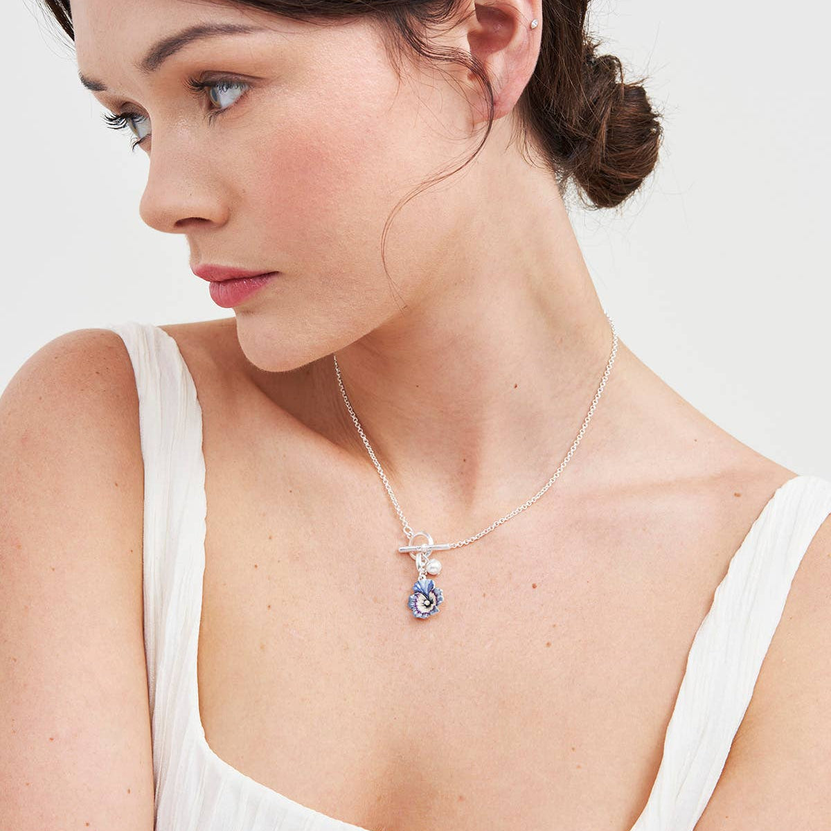 Model wearing pansy pearl silver toggle necklace
