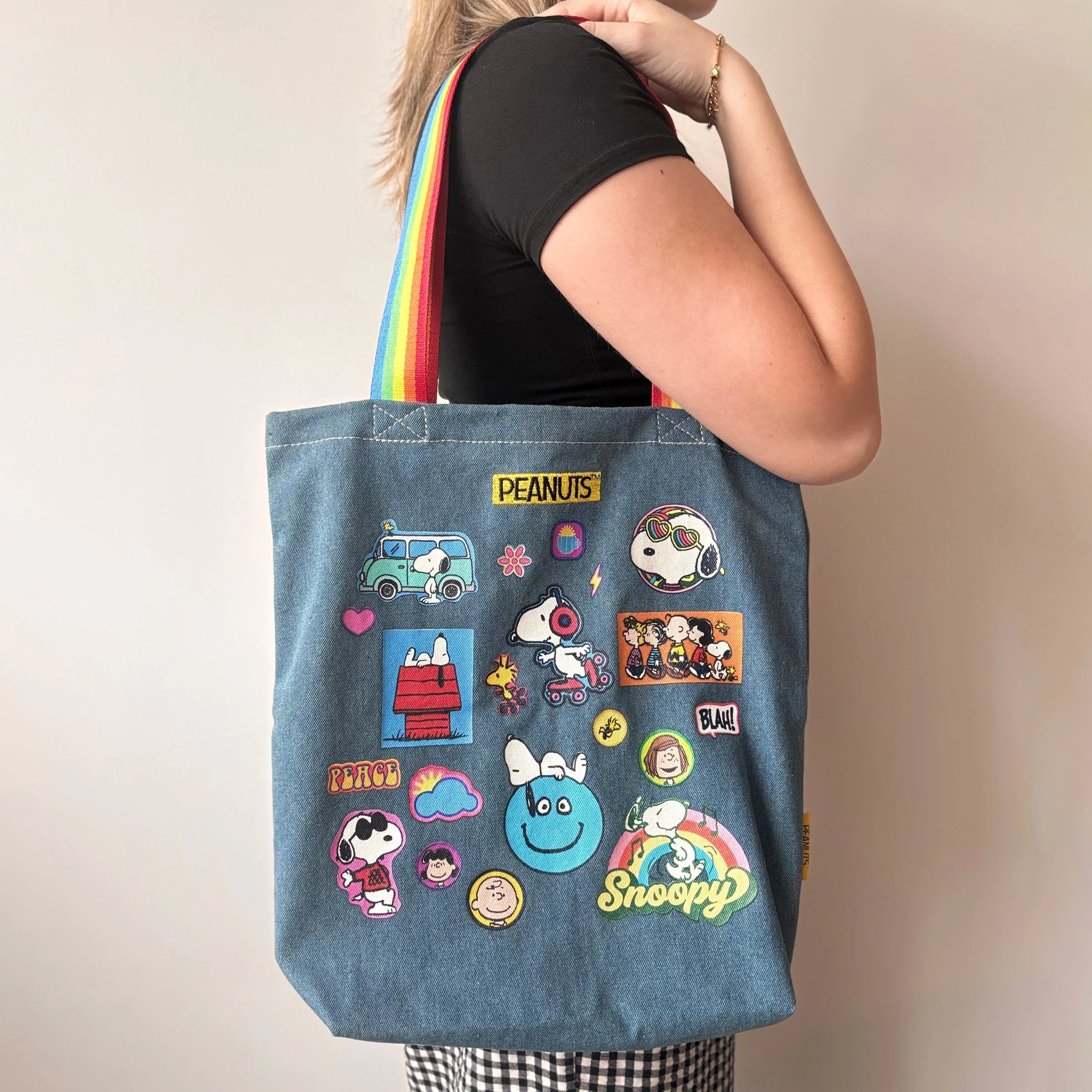 Peanuts Snoopy patch tote bag worn over shoulder