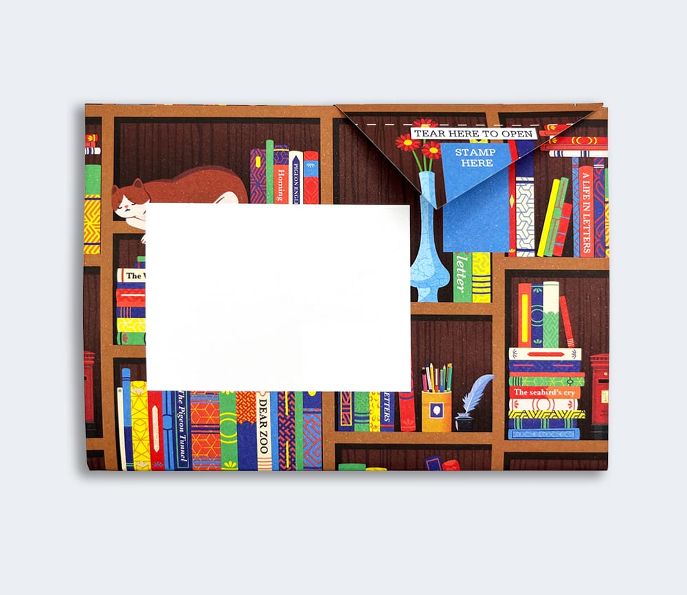 Folded Pigeon letter back showing bookshelf design with stamp area