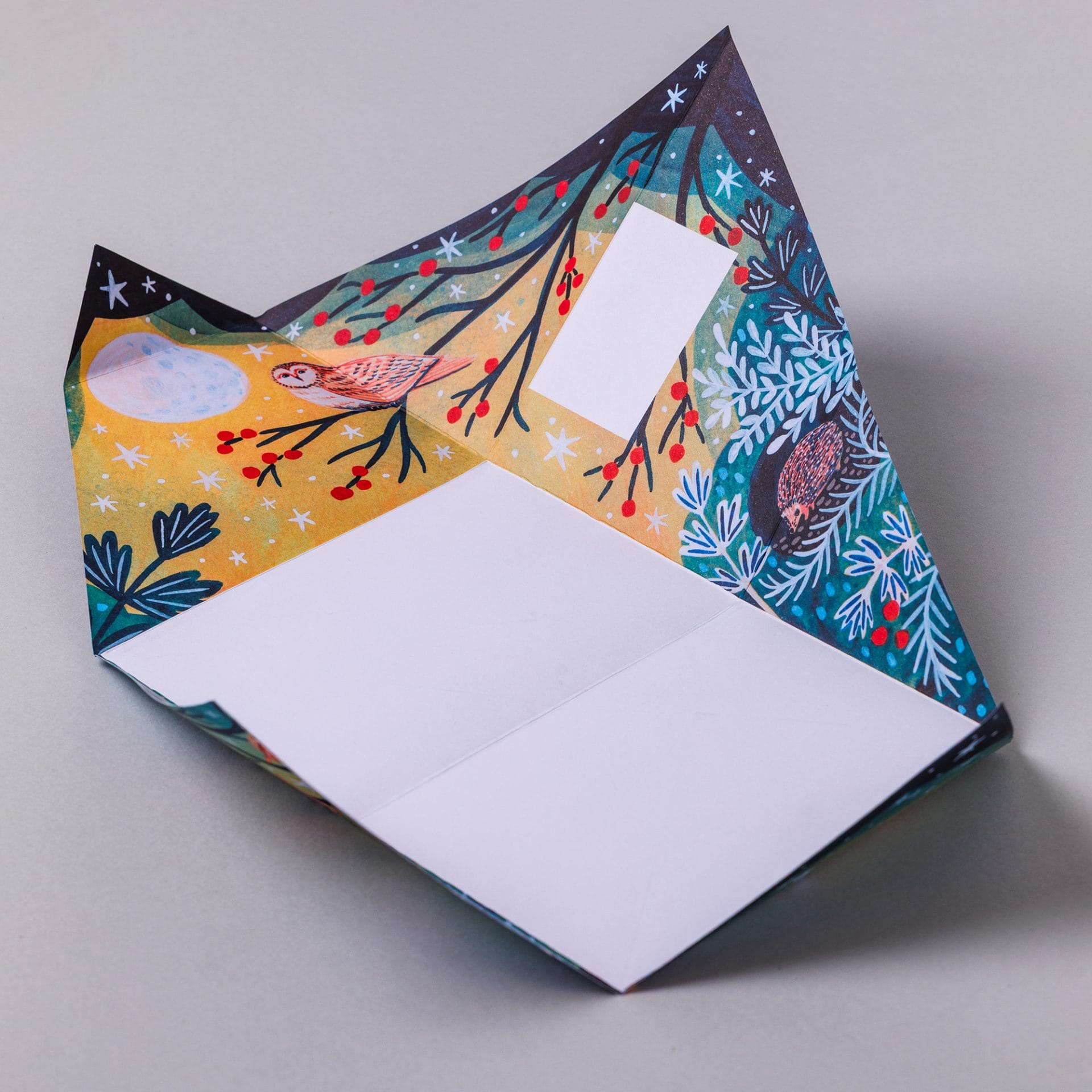 Harvest Moon Pigeons displayed with pack and unfolded designs on lavender background