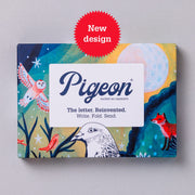 Harvest Moon Pigeons pack front with celestial design in blues and golds on grey