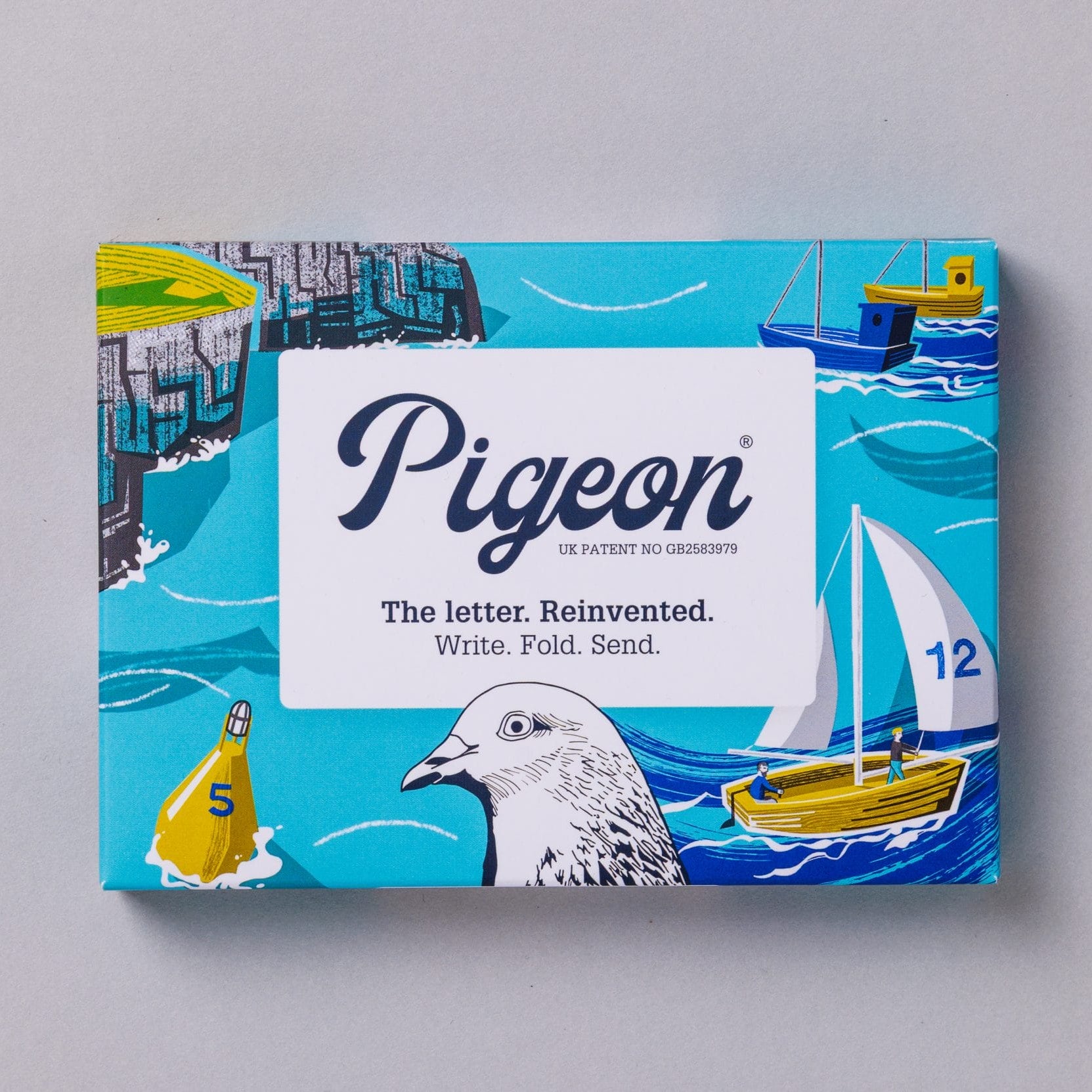 Safe Harbour Pigeons pack front with sailboat and harbour design on turquoise background