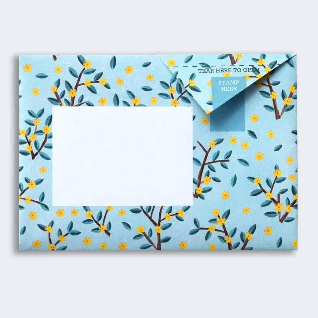 Folded Pigeon letter with bright wildflower pattern sixth variant on grey